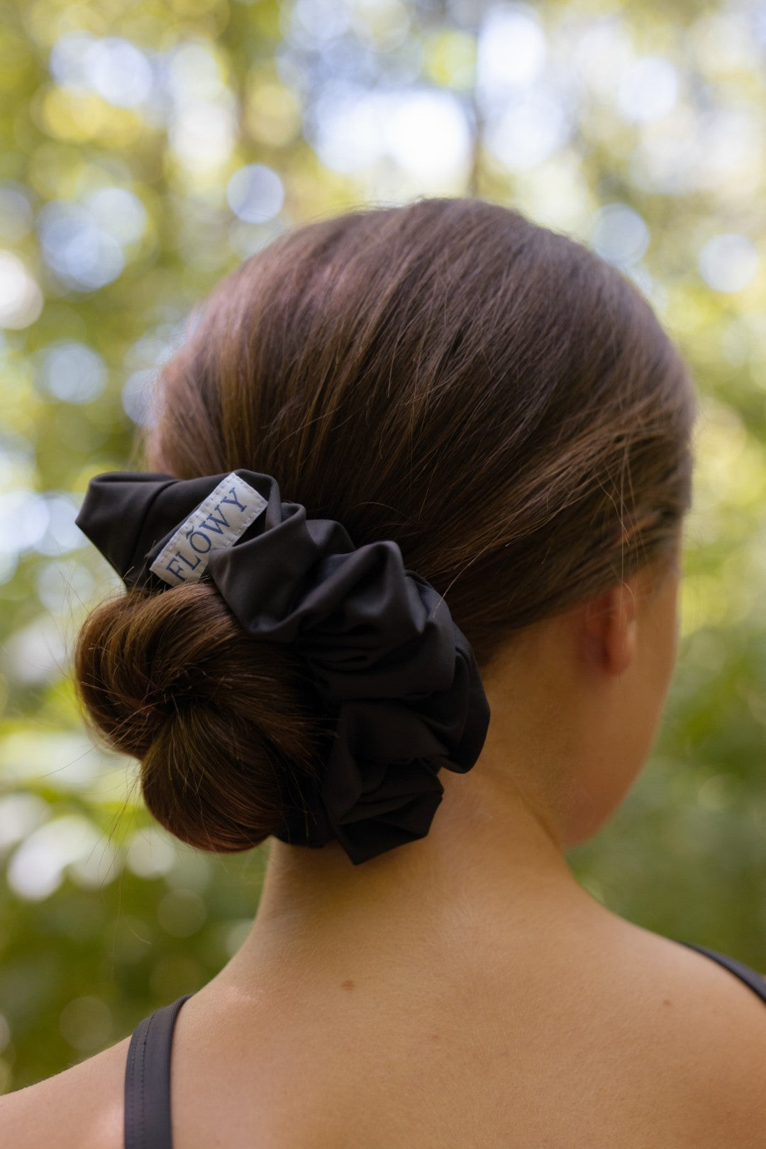 Gray Giselle Scrunchie in elegant bun