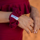 Burgundy Giselle Scrunchie worn on the hand as accessory