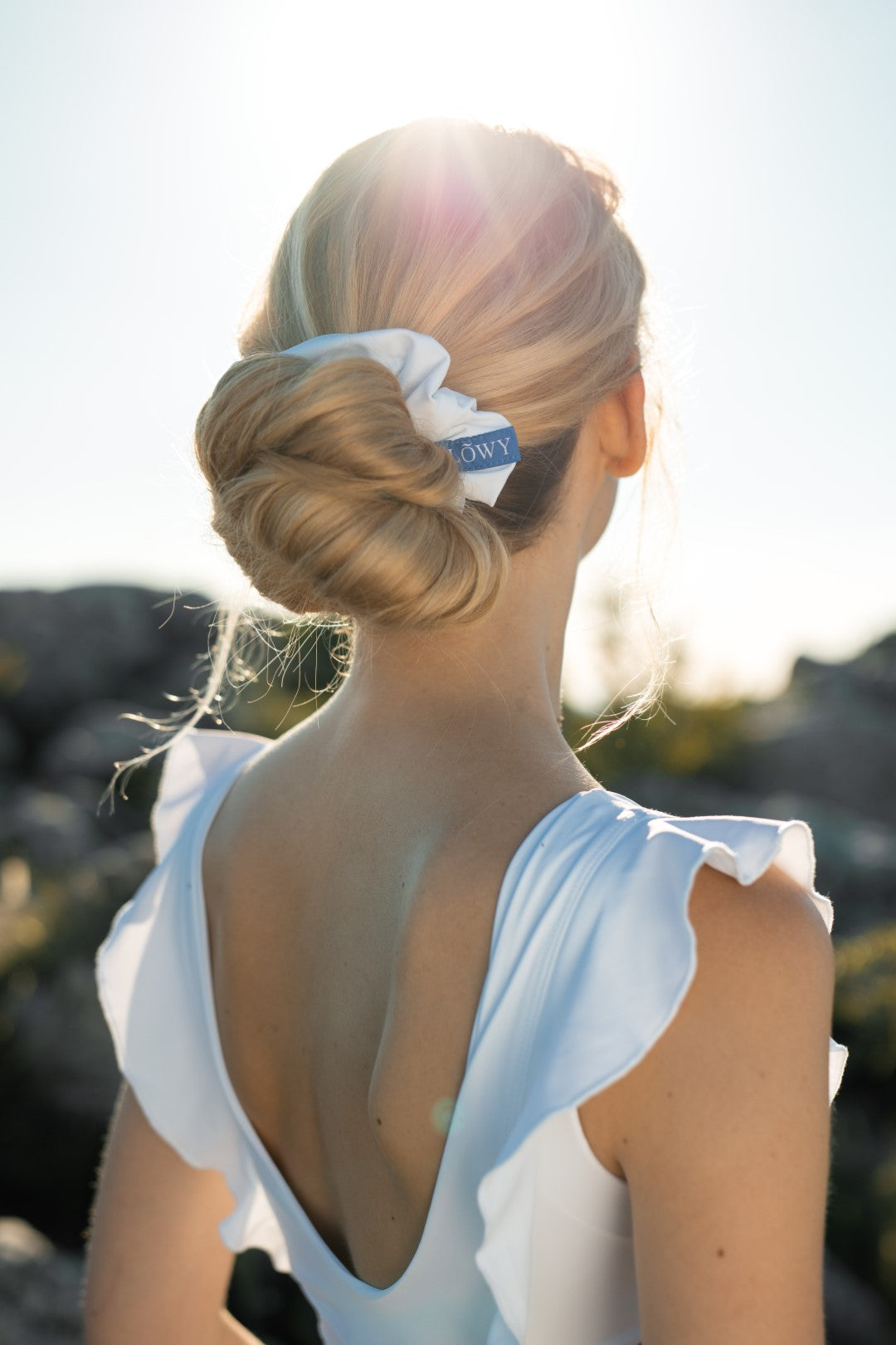 White Giselle Scrunchie in elegant bun